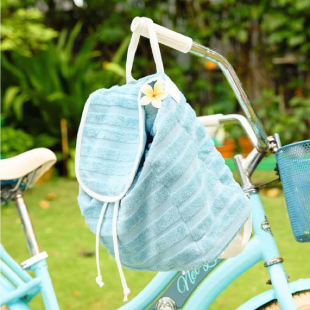 New Lu & Elle Vacay Everyday Blue Terry Backpack with white cinch string.